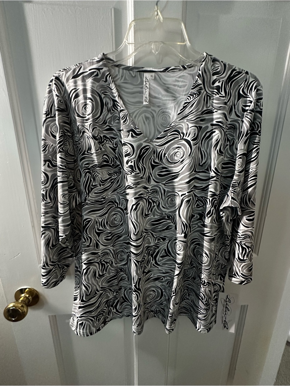 Lulu B Black & White Swirl V-Neck Women's Top